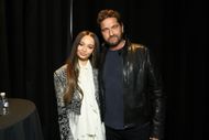 Nico Parker and Gerard Butler pose together during a screening of their film. (Image via Getty)